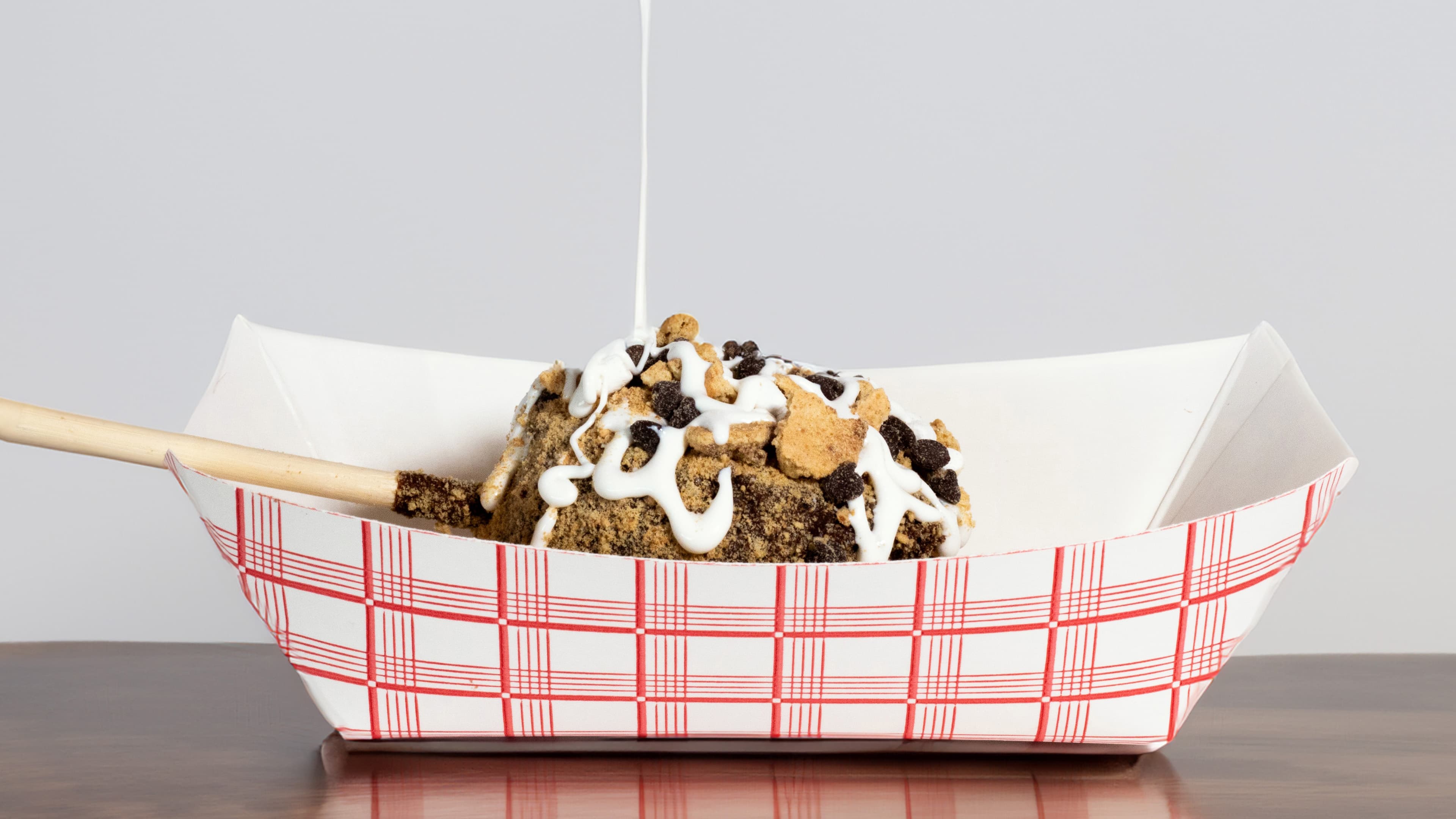 A loaded s'mores dessert with marshmallow drizzle